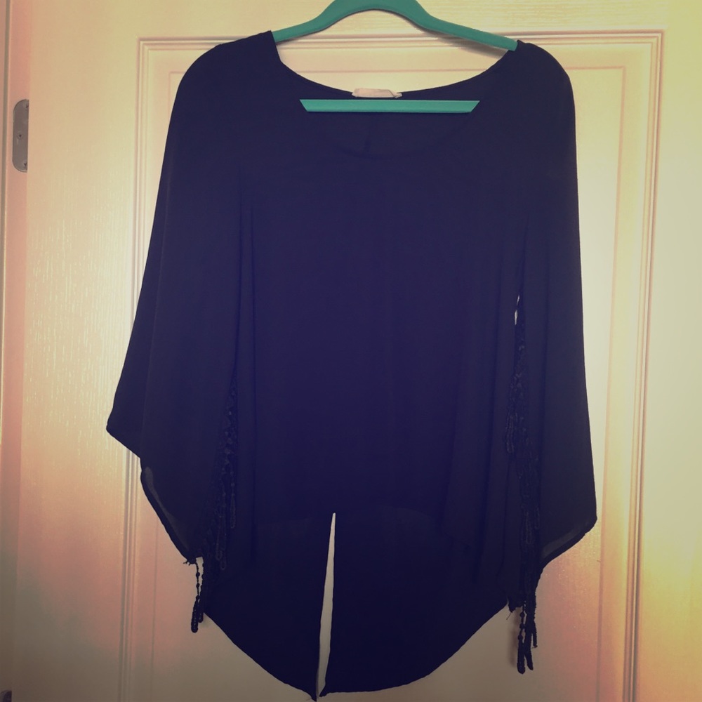 High/low black fringe sleeve top
